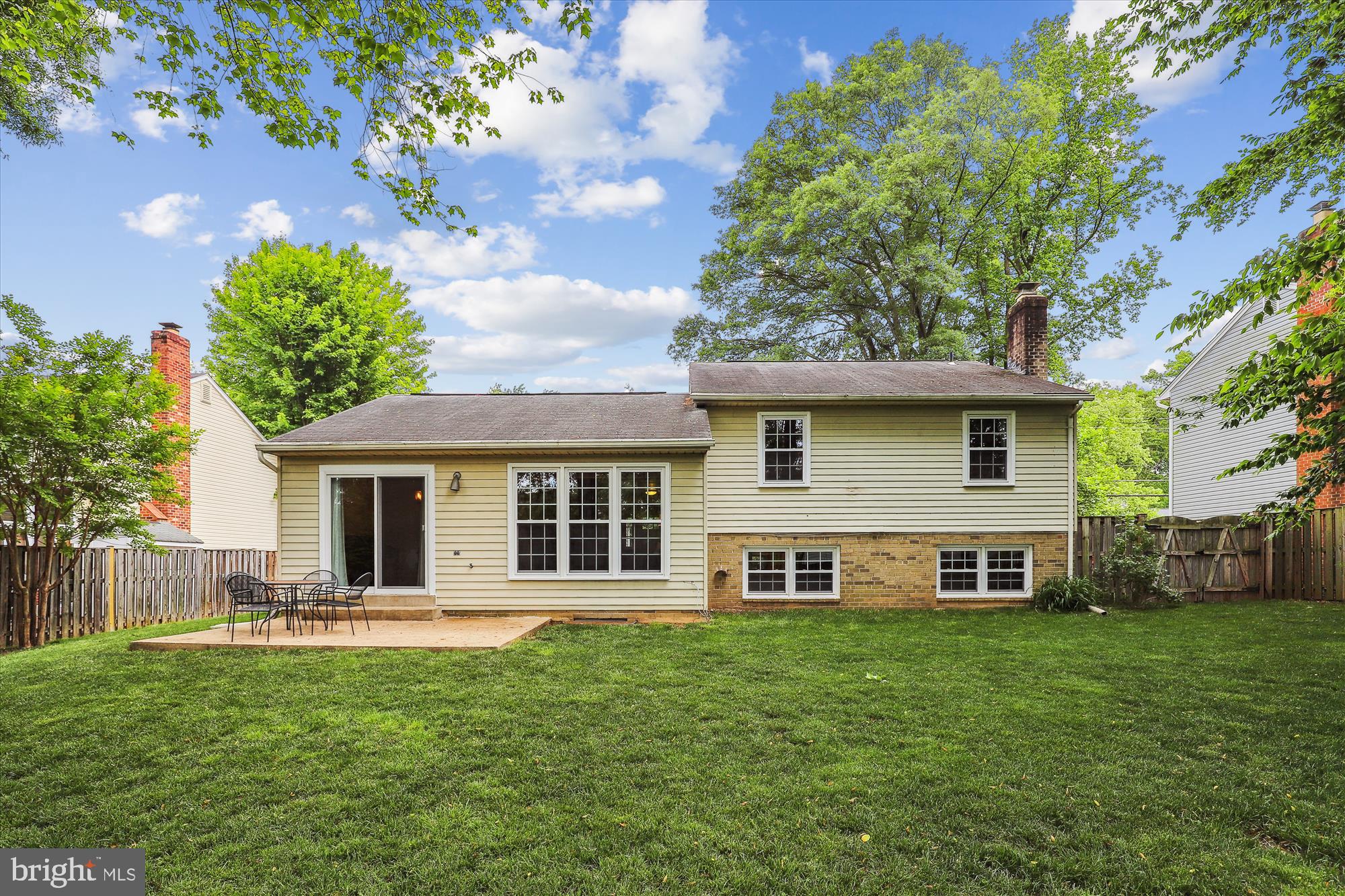 8322 Riverside Road Alexandria, VA 22308 - Photo 31 of 38 a front view of house with yard and green space