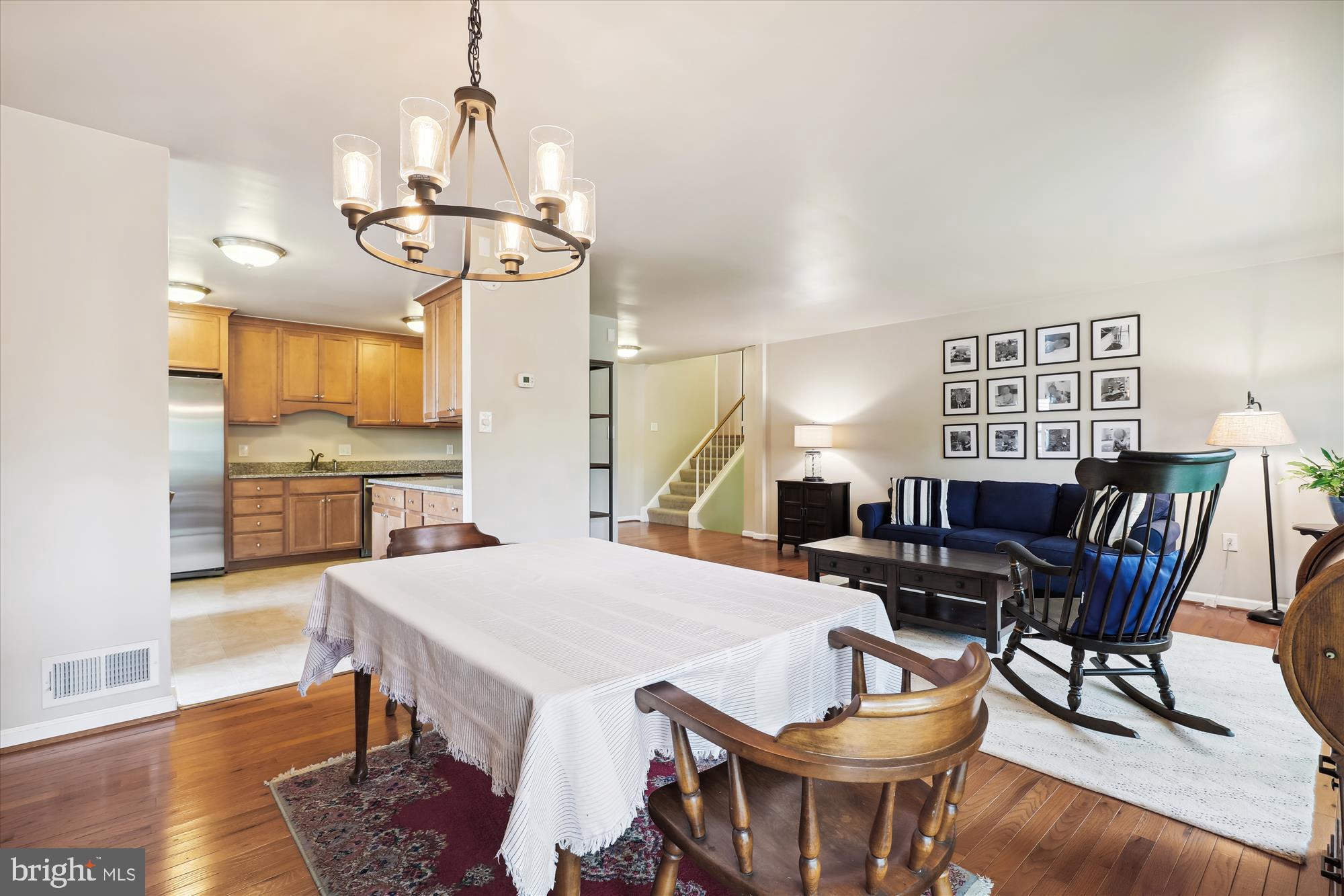 8322 Riverside Road Alexandria, VA 22308 - Photo 4 of 38 a view of a dining room with furniture window and wooden floor