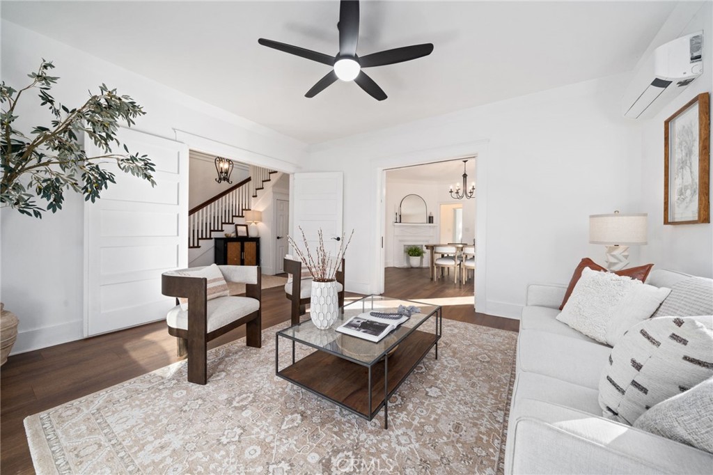 1148 Chestnut Avenue Long Beach, CA 90813 - Photo 7 of 32 a living room with furniture and a rug