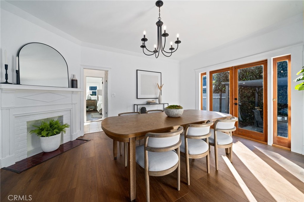 1148 Chestnut Avenue Long Beach, CA 90813 - Photo 8 of 32 a view of a dining room with furniture window and wooden floor
