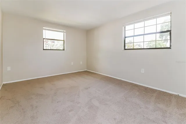 an empty room with windows