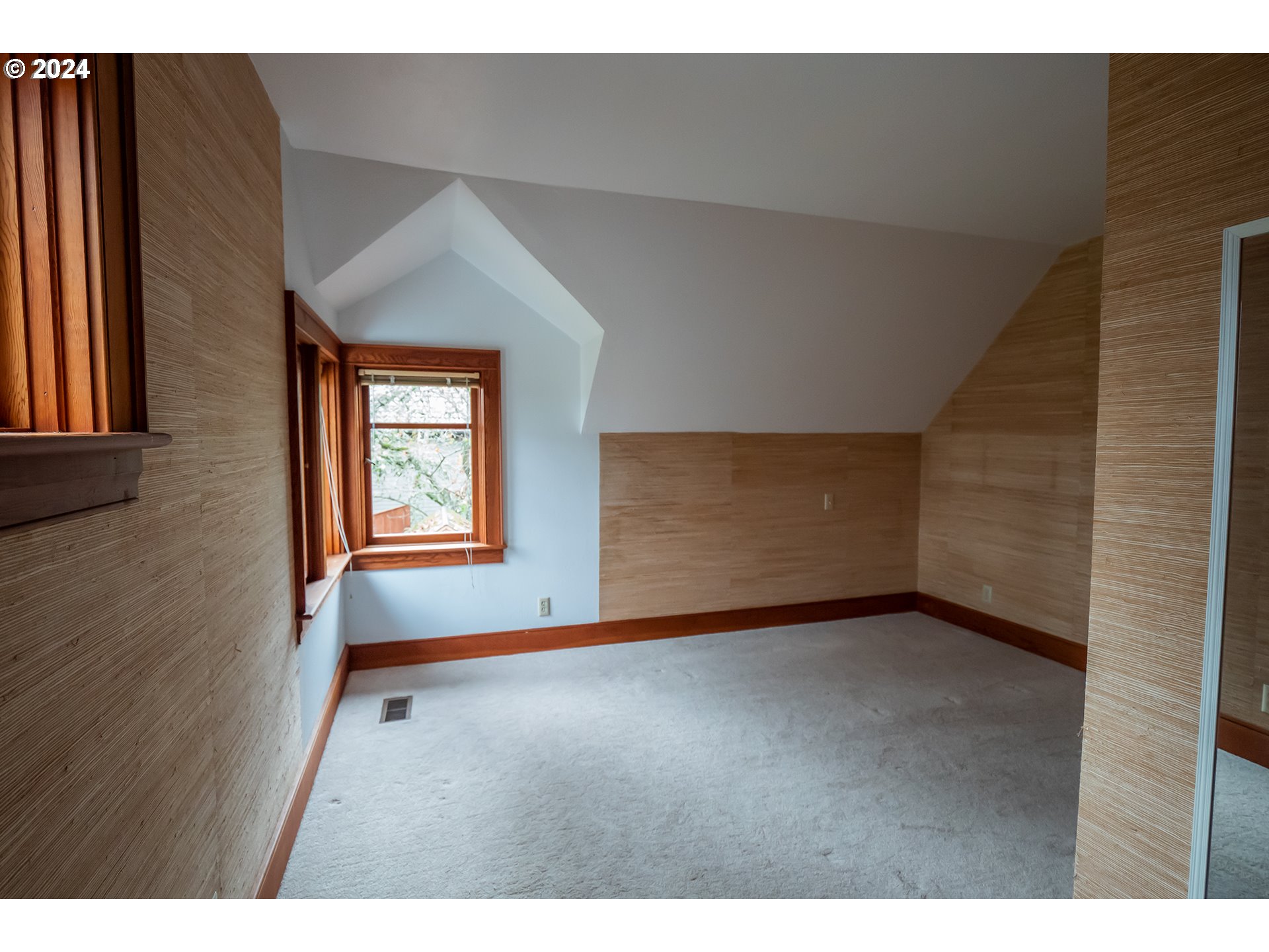 504 Spyglass Drive Eugene, OR 97401 - Photo 19 of 48 a view of an empty room with a window