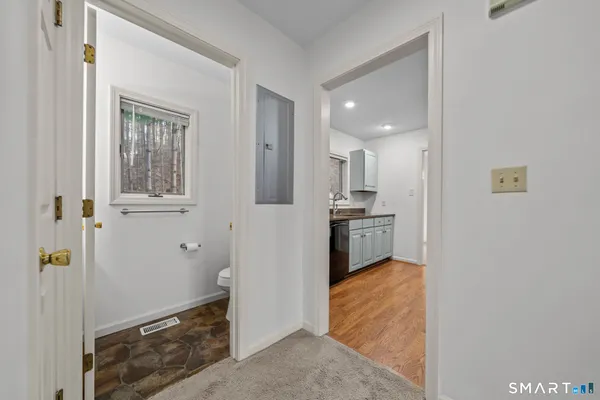 a view of a kitchen with a sink