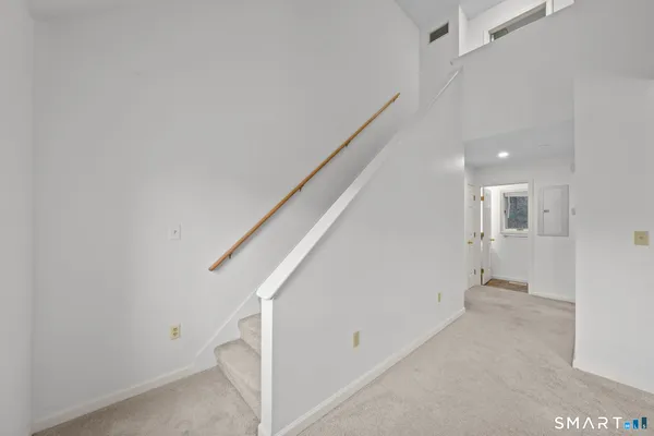 a view of hallway with stairs
