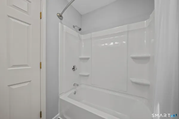 a bathroom with a bathtub