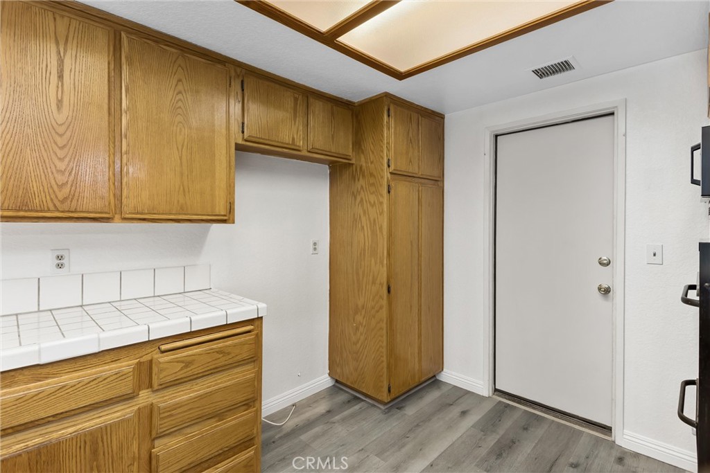 22246 Cardinal Street Grand Terrace, CA 92313 - Photo 11 of 28 a room with storage and utility