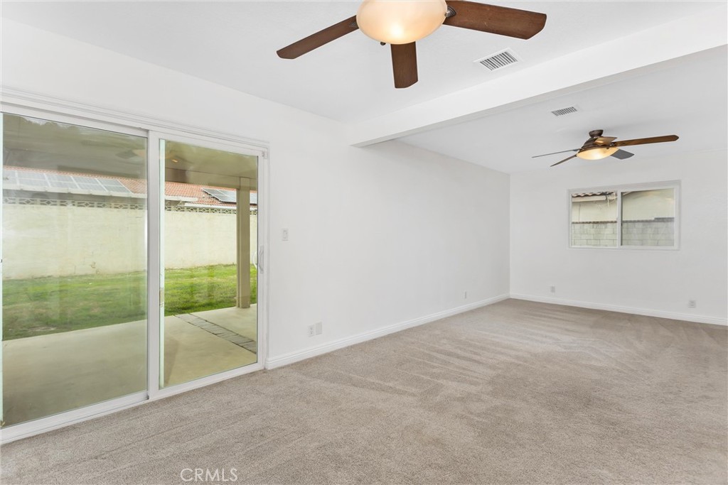 22246 Cardinal Street Grand Terrace, CA 92313 - Photo 18 of 28 an empty room with windows
