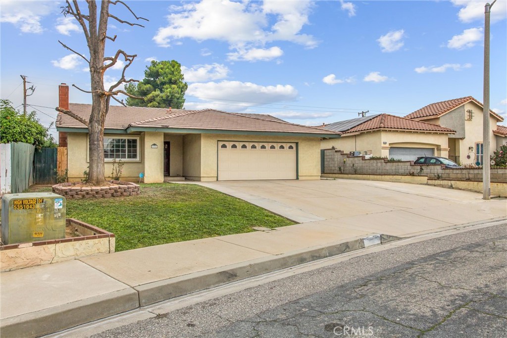 22246 Cardinal Street Grand Terrace, CA 92313 - Photo 4 of 28 a view of house with outdoor space and shower