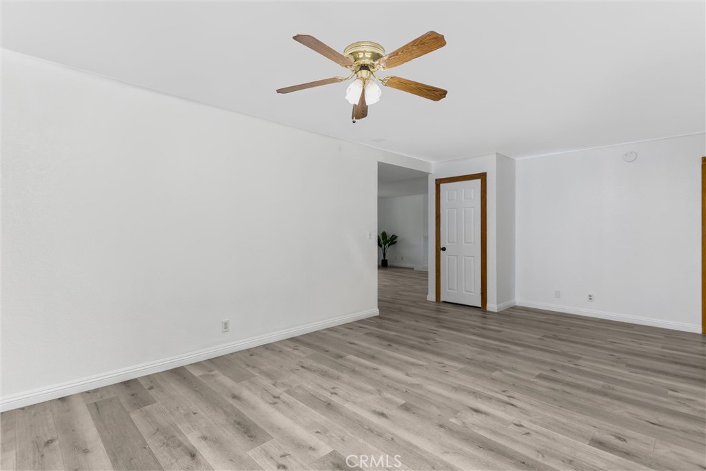 22246 Cardinal Street Grand Terrace, CA 92313 - Photo 8 of 28 wooden floor in an empty room
