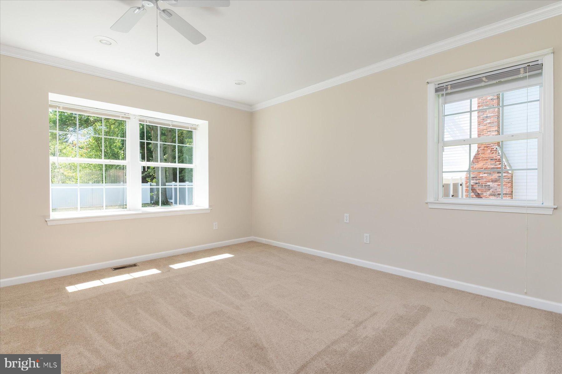 109 Calvert Road Stevensville, MD 21666 - Photo 35 of 41 Bright and airy bedroom with natural light.