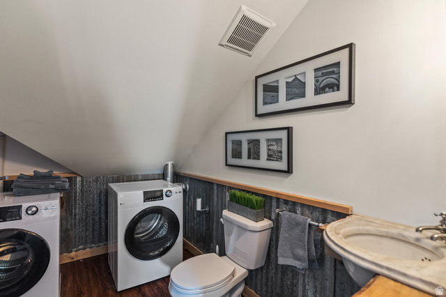 390 North 100 West Monroe, UT 84754 - Photo 129 of 167 Bathroom featuring washing machine and clothes dryer, lofted ceiling, wood finished floors, and vanity
