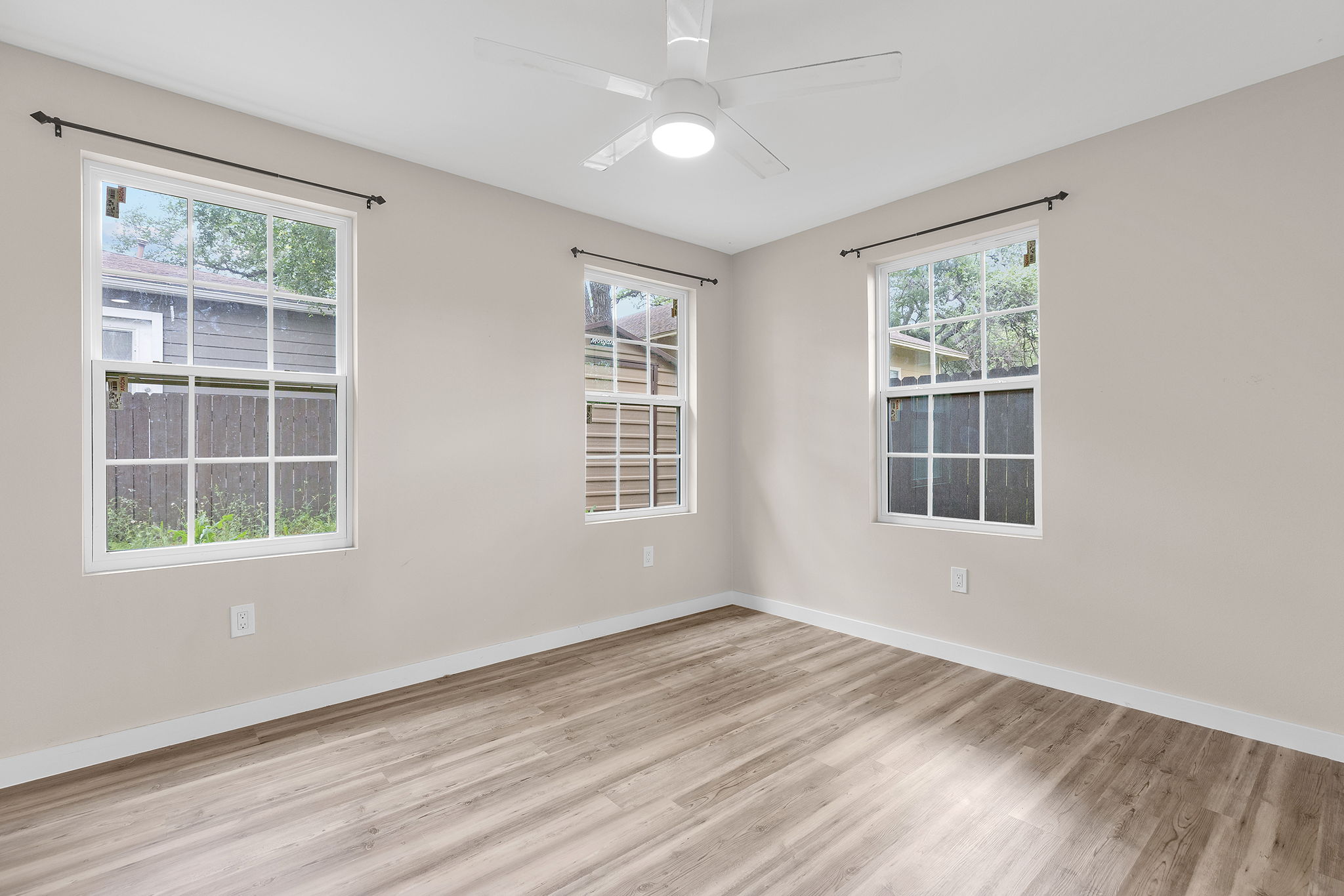 3909 Willbert Road, Unit B Austin, TX 78751 - Photo 14 of 16 Primary bedroom with 3 large windows