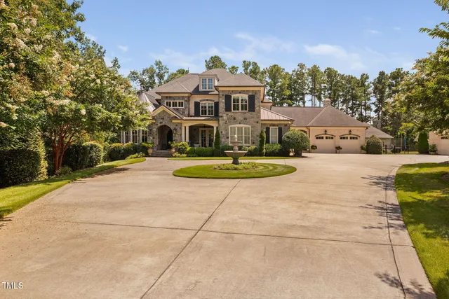 a front view of a building with garden