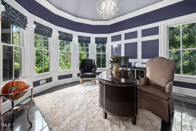 a kitchen with stainless steel appliances granite countertop counter space and wooden floors