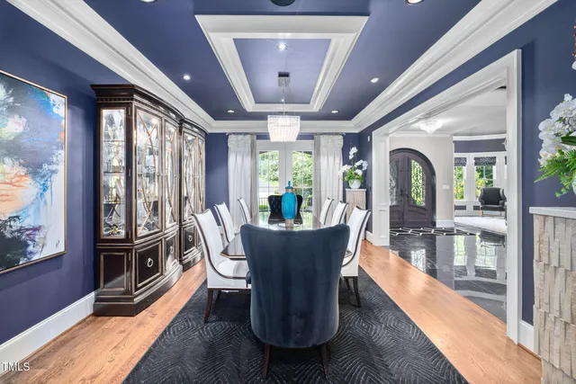 a kitchen with granite countertop a stove fireplace and a microwave