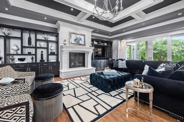 a kitchen with white cabinets and a sink