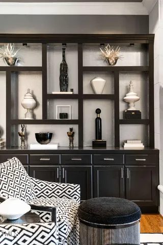 a bathroom with a toilet a sink and a mirror