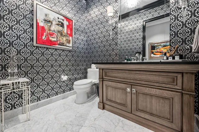 a bathroom with a sink a toilet and a bathtub