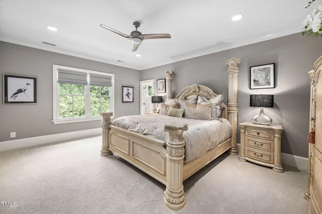 a room with pool table and windows