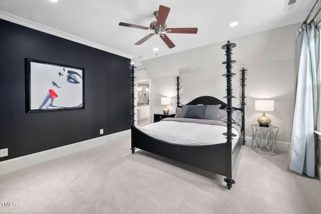 a living room with patio furniture and a potted plants