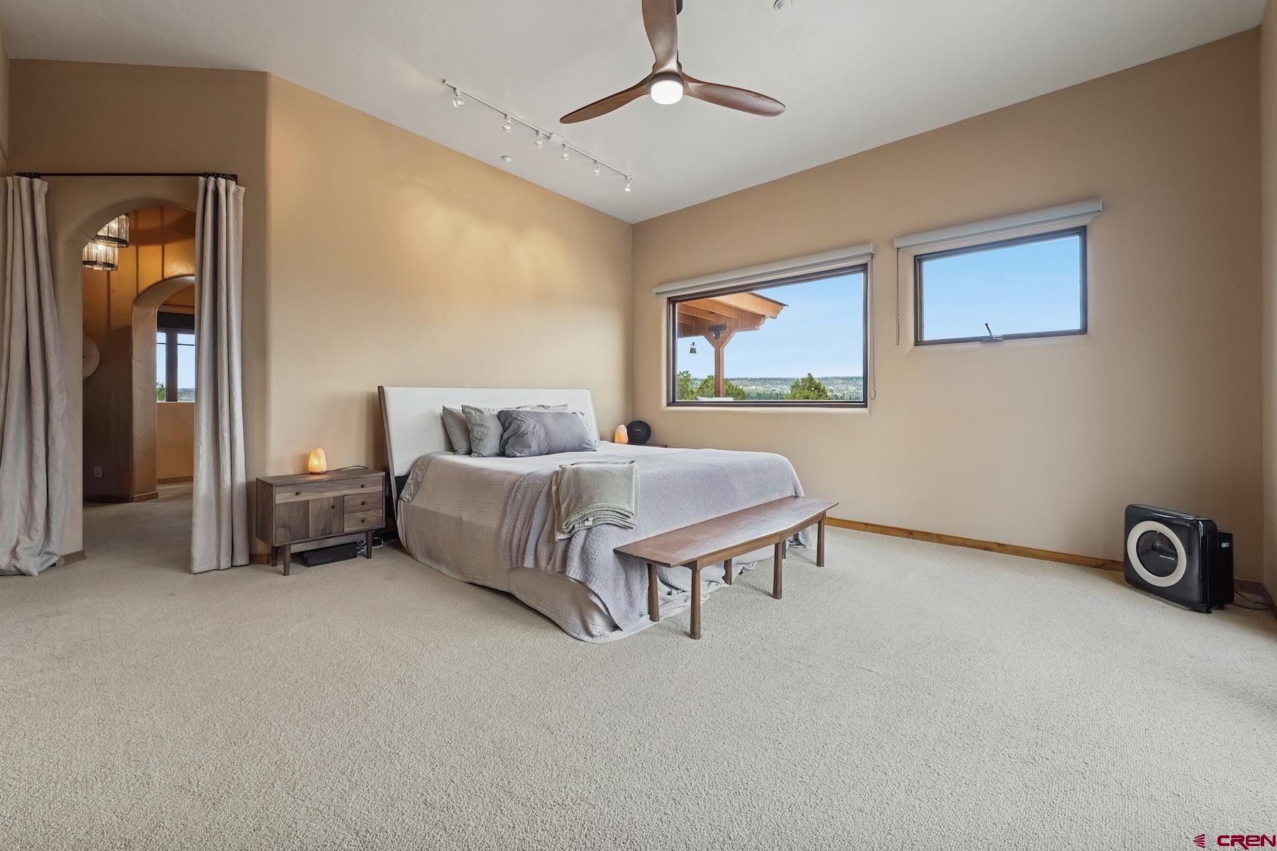 191 Deer Valley Road Hesperus, CO 81326 - Photo 19 of 45 a bedroom with a bed and a table