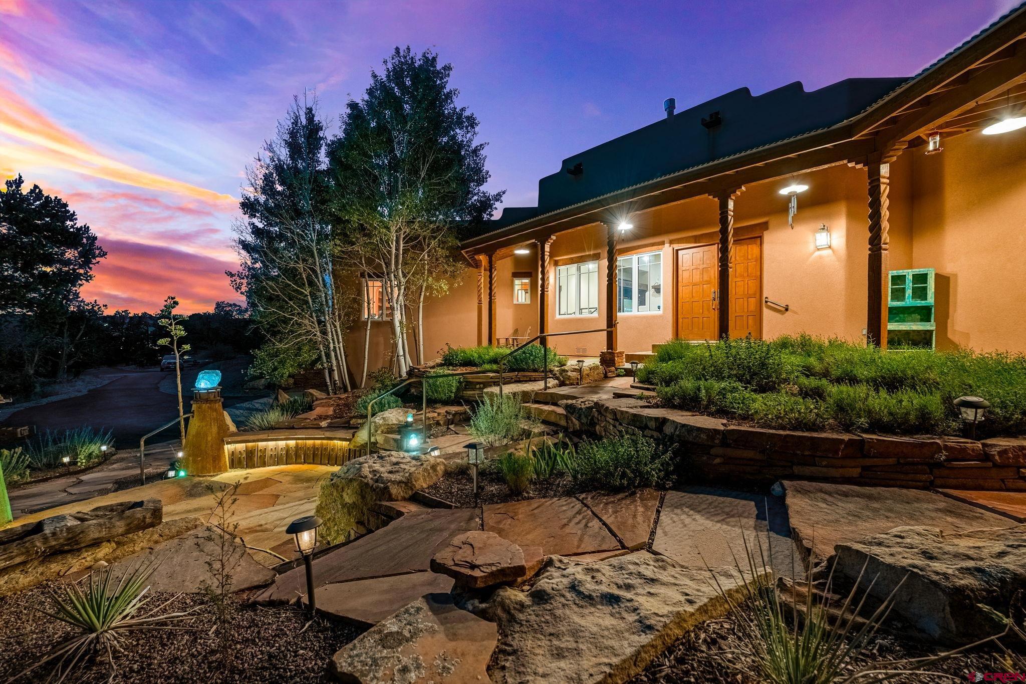 191 Deer Valley Road Hesperus, CO 81326 - Photo 2 of 45 a view of swimming pool with outdoor seating and plants in the background