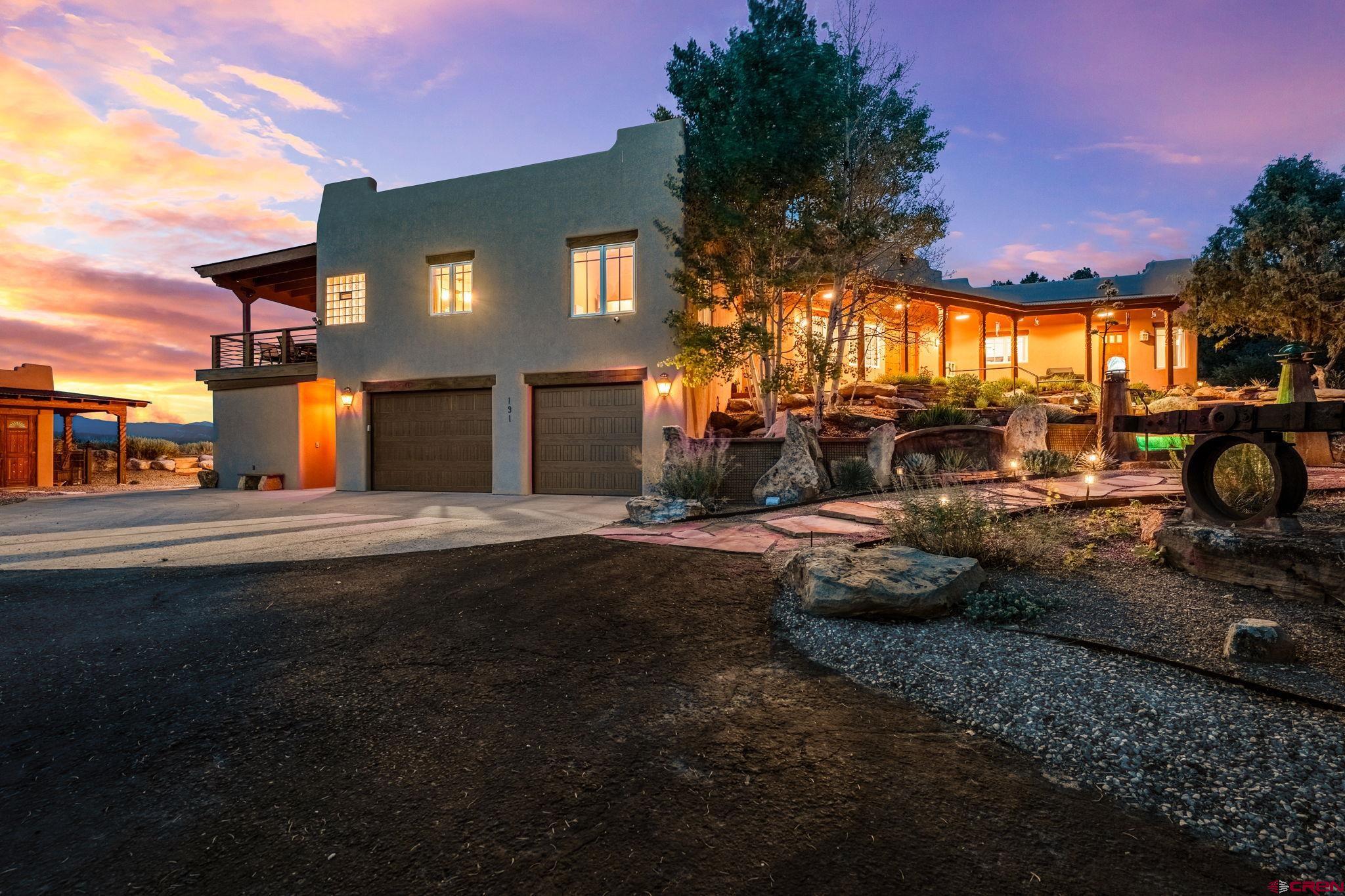 191 Deer Valley Road Hesperus, CO 81326 - Photo 25 of 45 a view of a house with backyard and sitting area