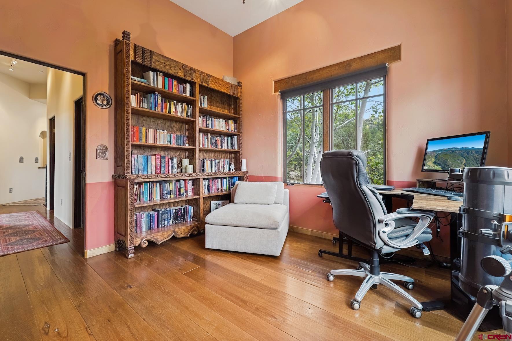 191 Deer Valley Road Hesperus, CO 81326 - Photo 26 of 45 a view of a livingroom with workspace and a window