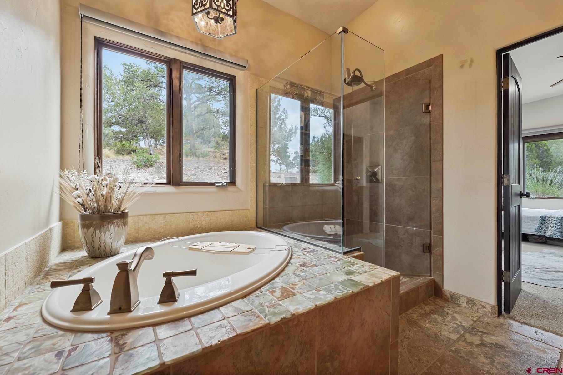 191 Deer Valley Road Hesperus, CO 81326 - Photo 36 of 45 a bath tub sitting next to a window