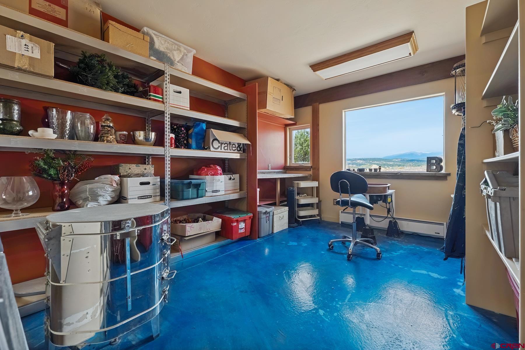 191 Deer Valley Road Hesperus, CO 81326 - Photo 41 of 45 a room with furniture and a wooden floor