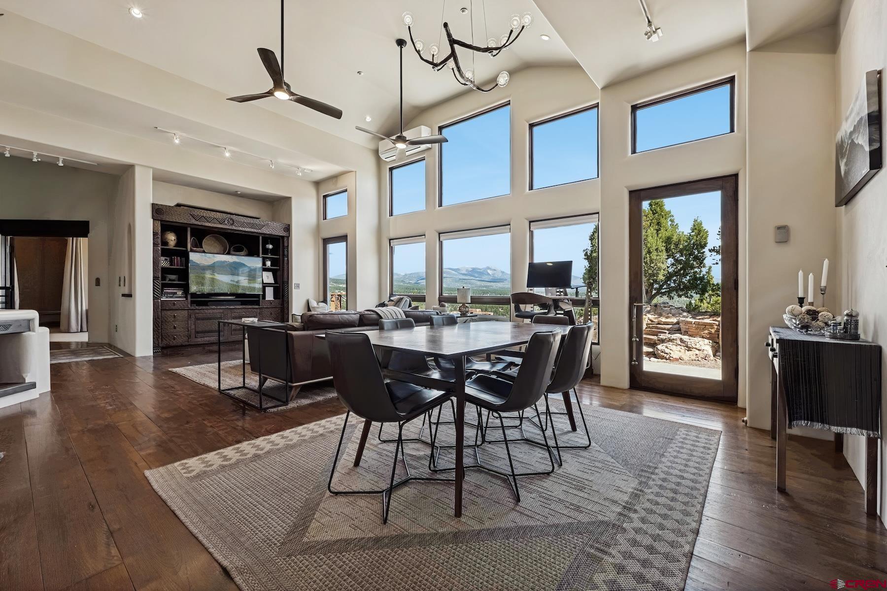 191 Deer Valley Road Hesperus, CO 81326 - Photo 8 of 45 a view of a dining room with furniture window and wooden floor