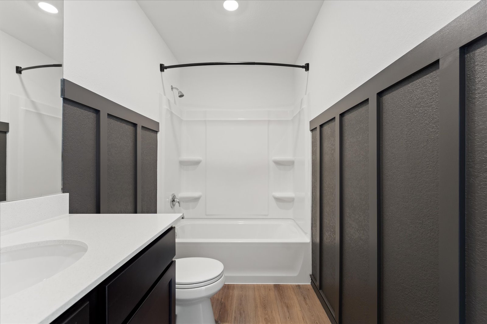 905 Powell Kyle, TX 78640 - Photo 20 of 37 a bathroom with a granite countertop sink toilet and shower