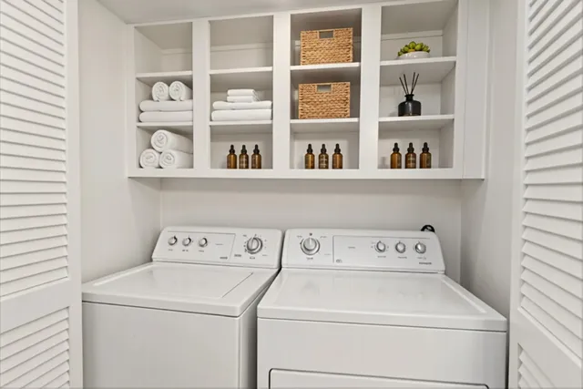 a utility room with dryer and washer
