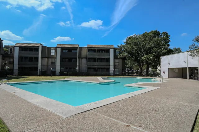 a view of a house with a swimming pool