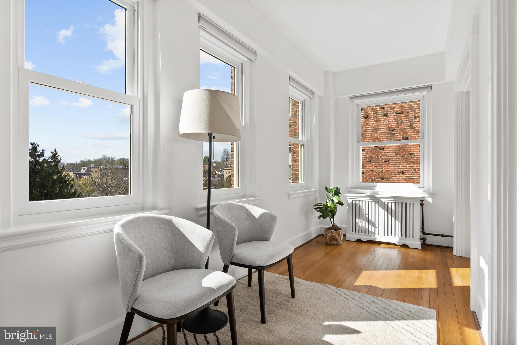 3601 Connecticut Avenue Northwest, Unit 409 Washington, DC 20008 - Photo 12 of 44 a living room with furniture and a window