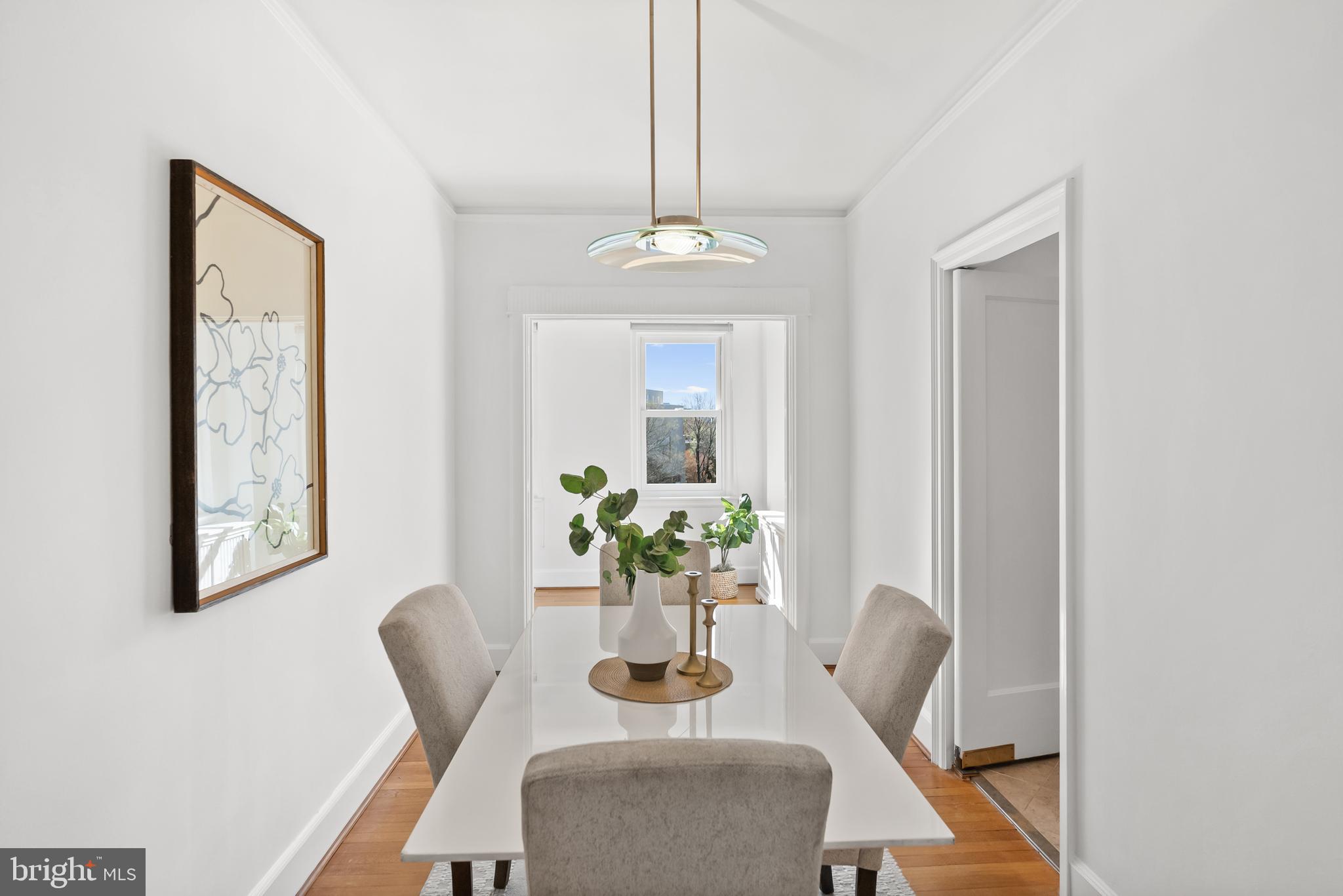 3601 Connecticut Avenue Northwest, Unit 409 Washington, DC 20008 - Photo 20 of 44 a dining room with furniture and window