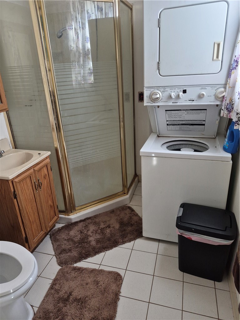 1259 West Bloomfield Road Mendon, NY 14472 - Photo 14 of 24 Tiled flooring and a walk-in shower frame this functional space. Also includes the washer/dryer on the 1st floor.