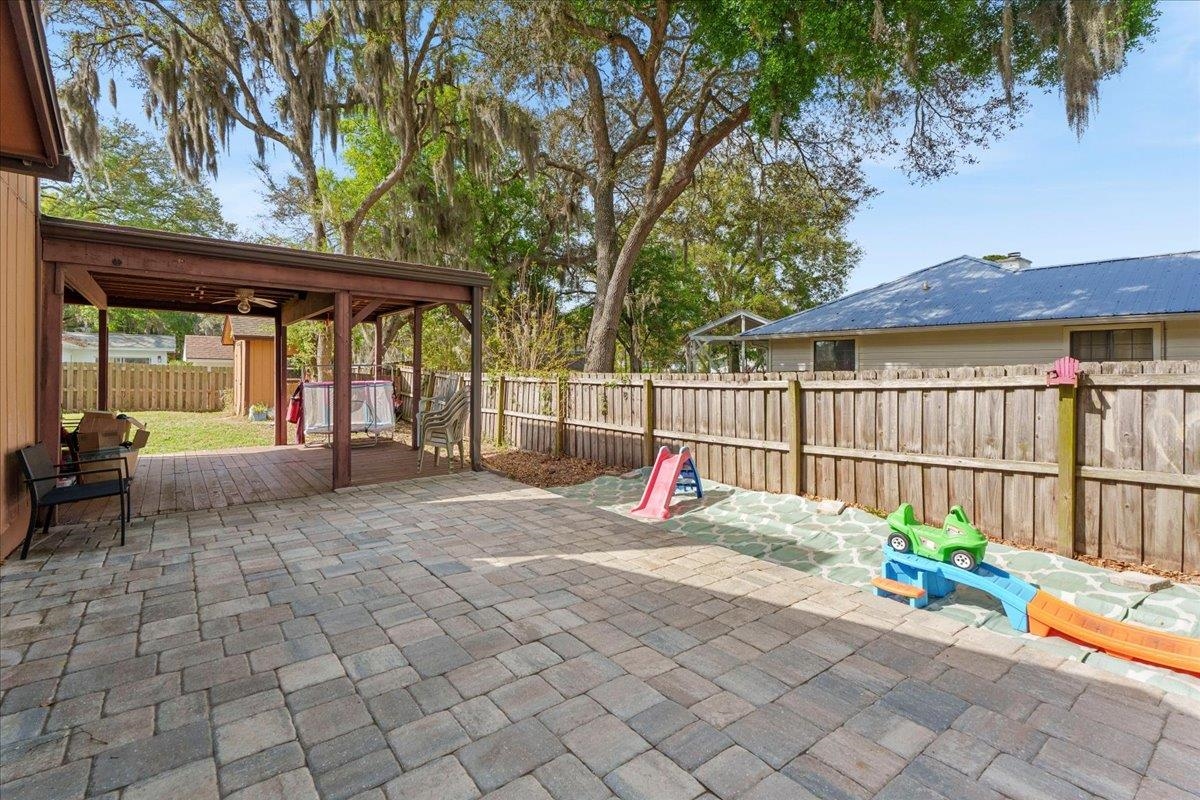 204 Queen Road St. Augustine, FL 32086 - Photo 30 of 55 Fenced backyard featuring a patio area