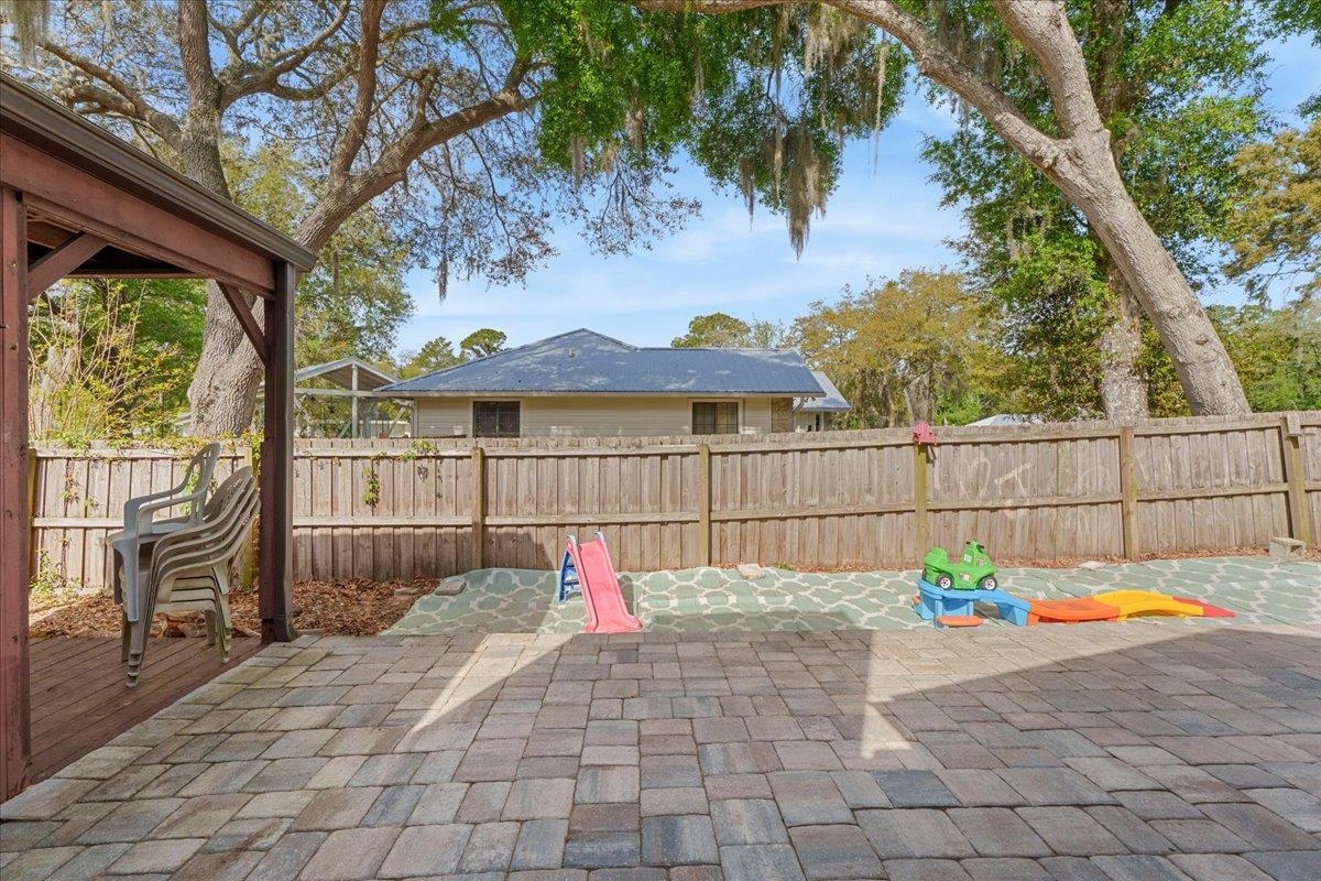 204 Queen Road St. Augustine, FL 32086 - Photo 31 of 55 Fenced backyard featuring a patio area and a gazebo