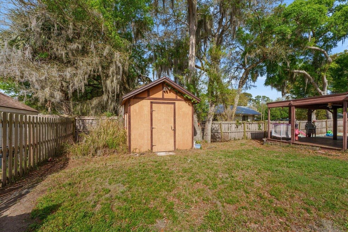 204 Queen Road St. Augustine, FL 32086 - Photo 37 of 55 View of shed featuring a fenced backyard