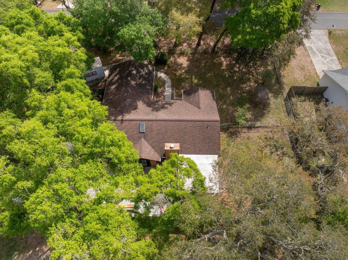 204 Queen Road St. Augustine, FL 32086 - Photo 45 of 55 View from above of property with a tree filled landscape