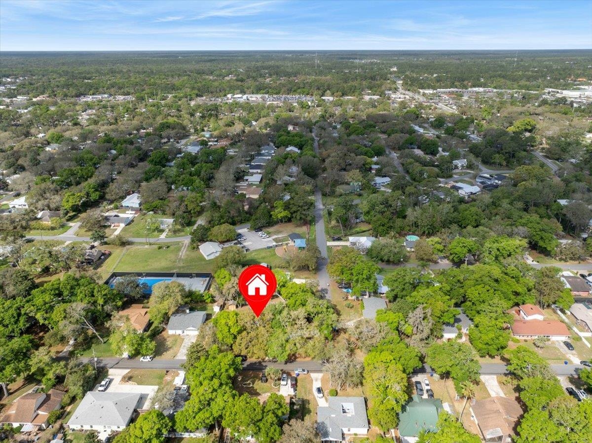204 Queen Road St. Augustine, FL 32086 - Photo 48 of 55 Aerial perspective of suburban area featuring a forest