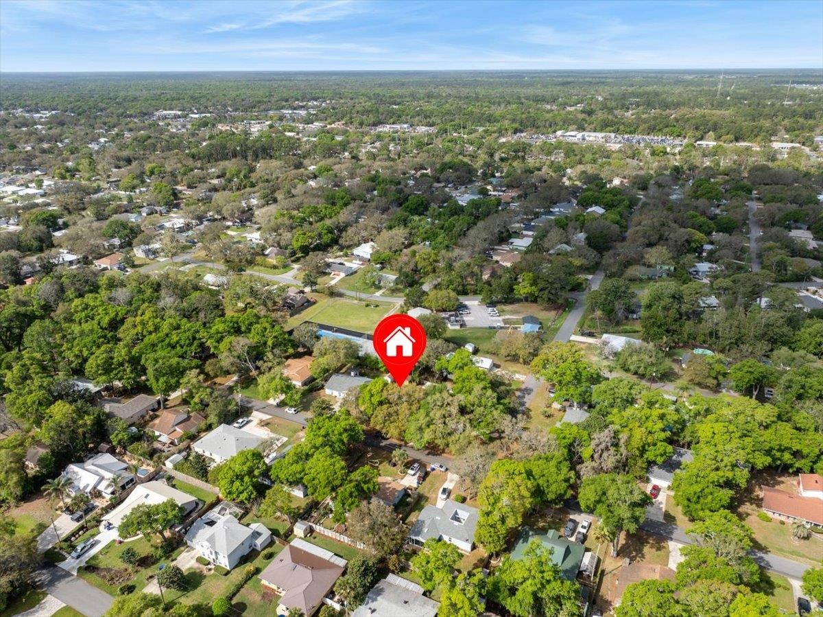 204 Queen Road St. Augustine, FL 32086 - Photo 49 of 55 Aerial perspective of suburban area with a heavily wooded area