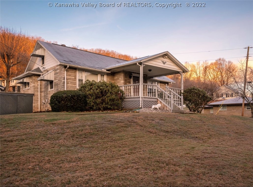 5257 Doc Bailey Road Charleston, WV 25313 - Photo 2 of 22 One car attached garage & carport on left side of home