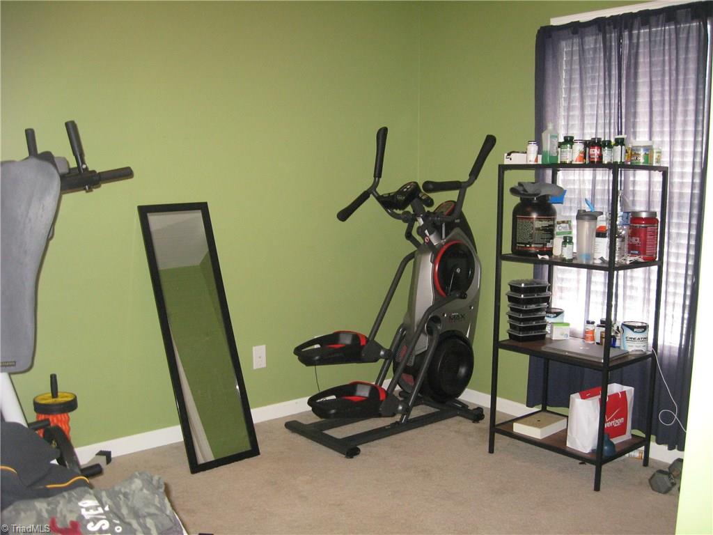 6960 Rangecrest Road Belews Creek, NC 27009 - Photo 13 of 26 Third Bedroom, currently used as a workout area.