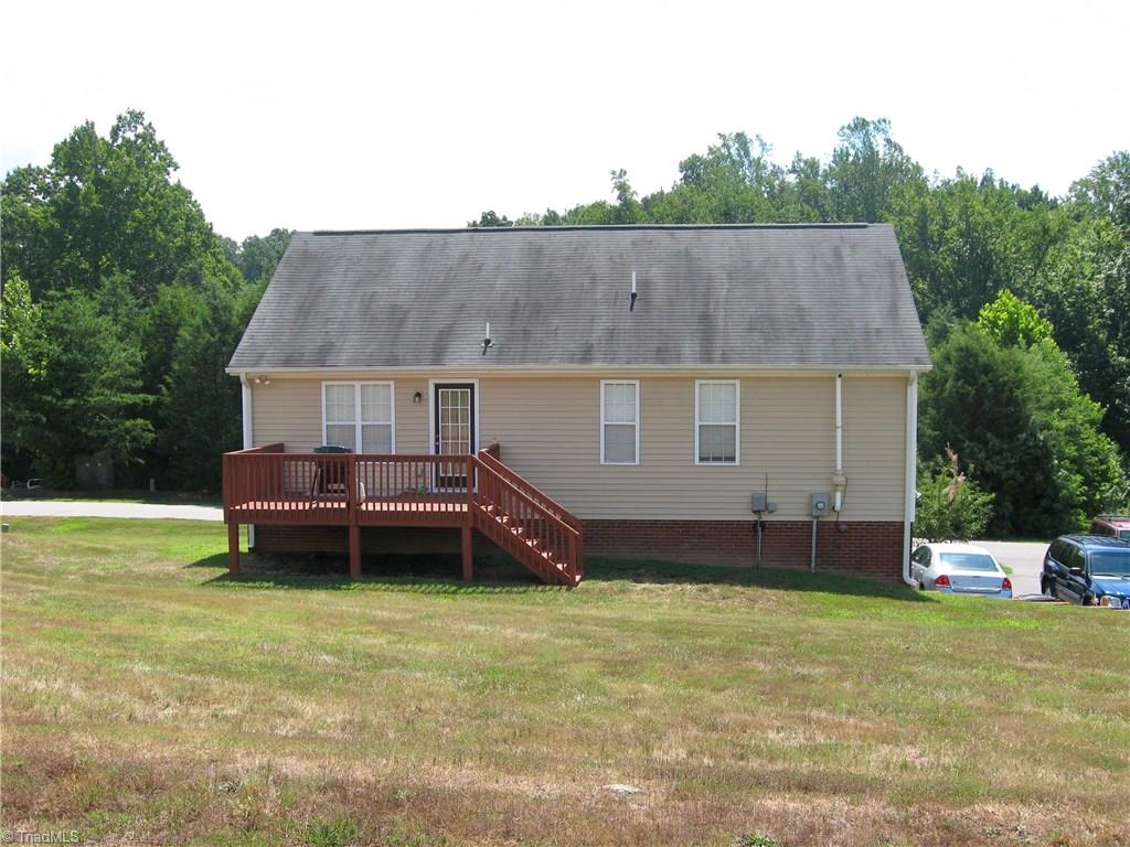 6960 Rangecrest Road Belews Creek, NC 27009 - Photo 20 of 26 back side of the house . . . nice deck area for your grill and entertaining!!!!