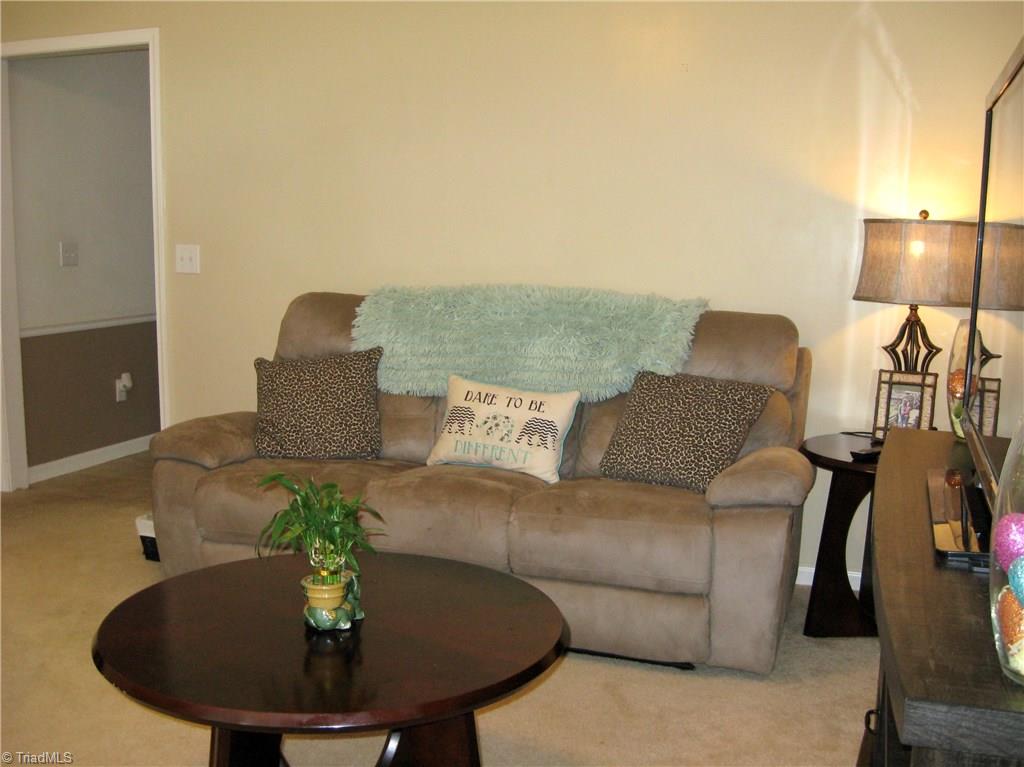 6960 Rangecrest Road Belews Creek, NC 27009 - Photo 3 of 26 Living Room area complete with a vaulted ceiling!!!
