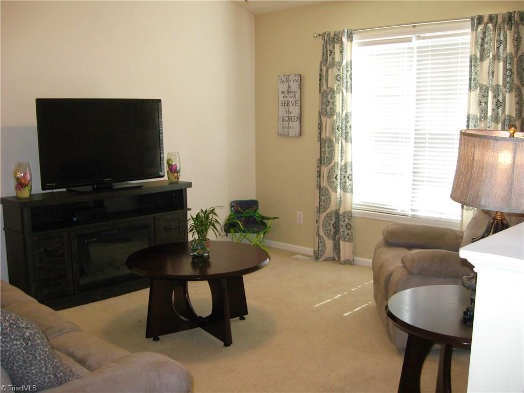 6960 Rangecrest Road Belews Creek, NC 27009 - Photo 4 of 26 Another view of the Living Room area . . . nice large windows to give you plenty of outside light!
