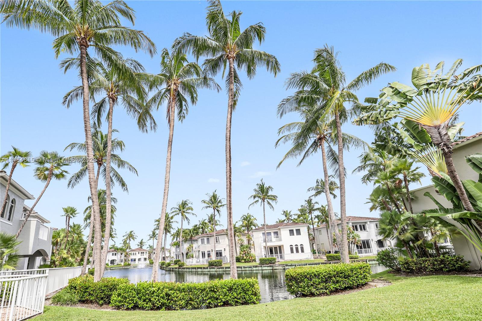 3015 Northeast 208th Street, Unit 3015 Aventura, FL 33180 - Photo 45 of 53 a view of a park with palm trees