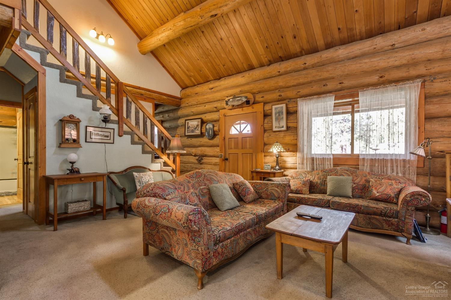 19375 Mohawk Road Bend, OR 97702 - Photo 10 of 25 a living room with furniture and a window